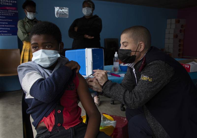 A boy receives a Covid-19 vaccination at a site near Johannesburg. The World Health Organisation's Africa director Matshidiso Moeti says the continent is moving into the ‘control phase’ of the pandemic. AP 