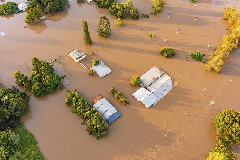 Water floods streets and houses in Maryborough, Australia. Heavy rain is bringing record flooding to some east coast areas while the flooding in Brisbane is the worst since 2011. AP