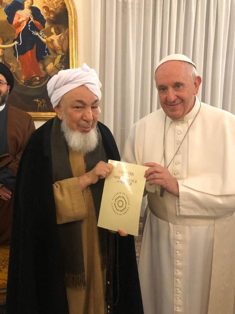 Imam Abdullah bin Bayyah, chairman of the UAE Fatwa Council, and Pope Francis meet in the Vatican City on Wednesday. Wam