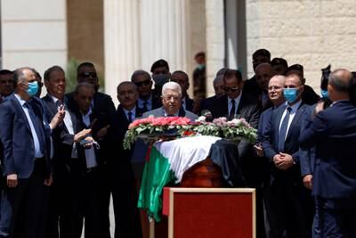 Palestinian President Mahmoud Abbas pays his respects to Al Jazeera journalist Shireen Abu Akleh in Ramallah, the Israeli-occupied West Bank. Reuters