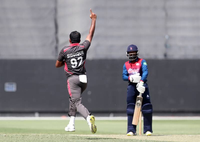 UAE's Junaid Siddique after dismissing Nepal's Dipendra Singh Airee. 