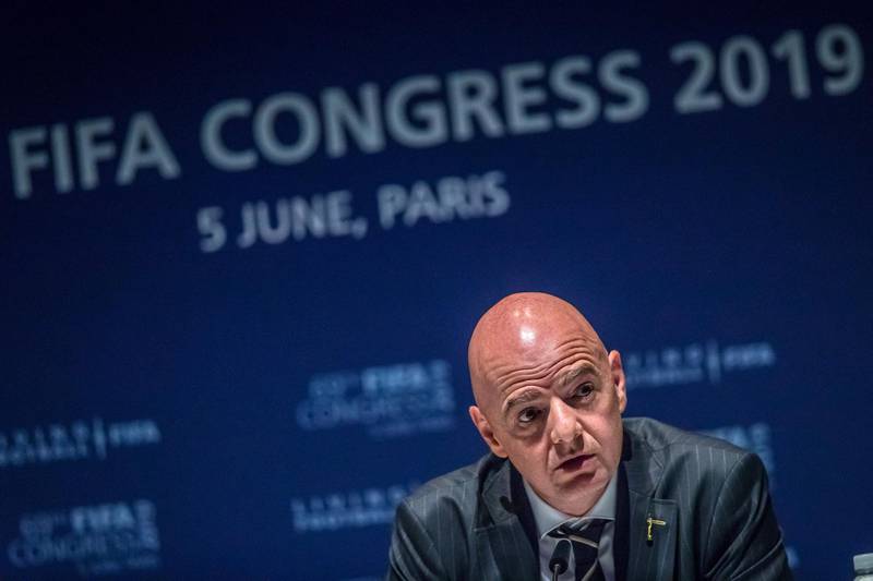 epa07627456 FIFA president Gianni Infantino speaks during a press conference after been re-elected for a second term as the head of FIFA during the 69th FIFA Congress in Paris, France, 05 June 2019.  EPA/CHRISTOPHE PETIT TESSON