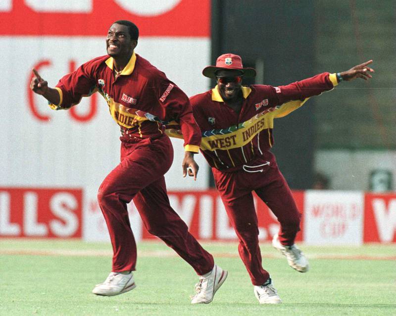 11 Mar 1996:  Roger Harper of West Indies and his captain Richie Richardson celebrate the wicket of Steve Palframan of South Afica in the World Cup quarter-final between South Africa and West Indies at the National Stadium in Karachi, Pakistan. MandatoryCredit: Allsport UK/ALLSPORT/Getty Images