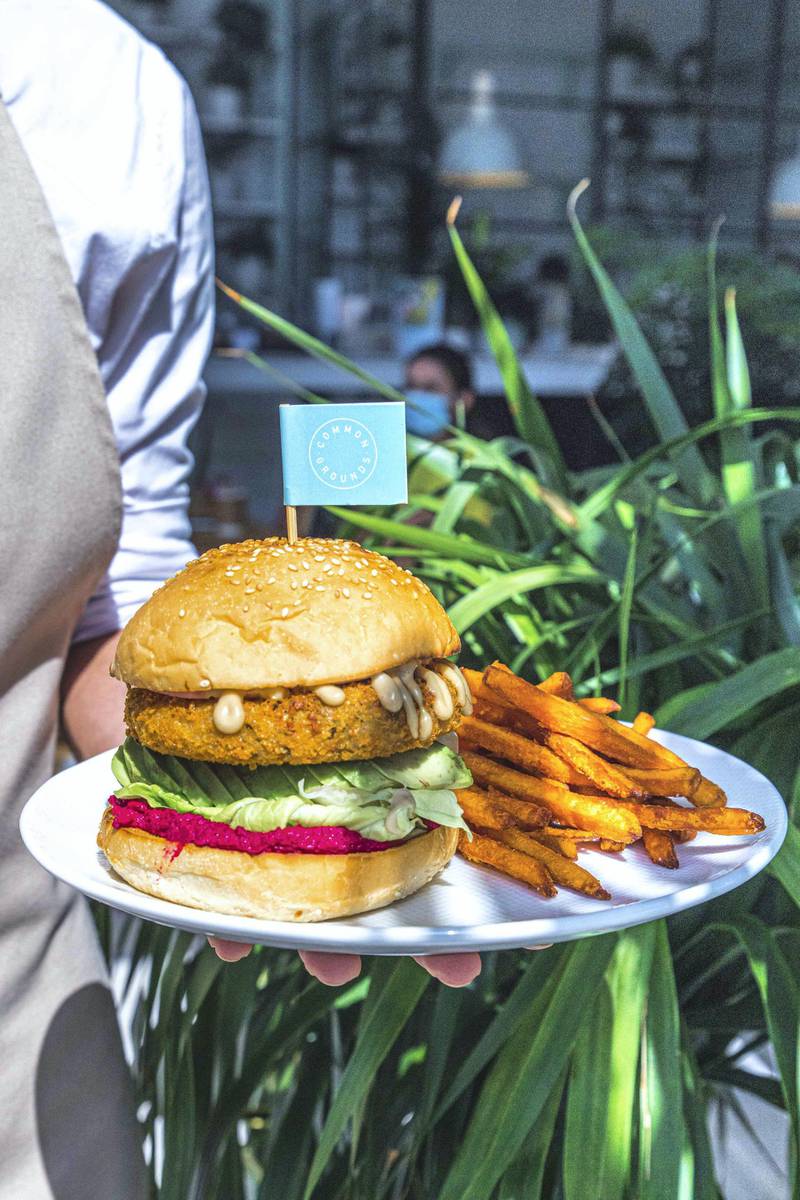 Common Grounds' avocado burger, with an avocado and chickpea patty, beetroot hummus, vegan mayo, served with either sweet potato fries or salad.