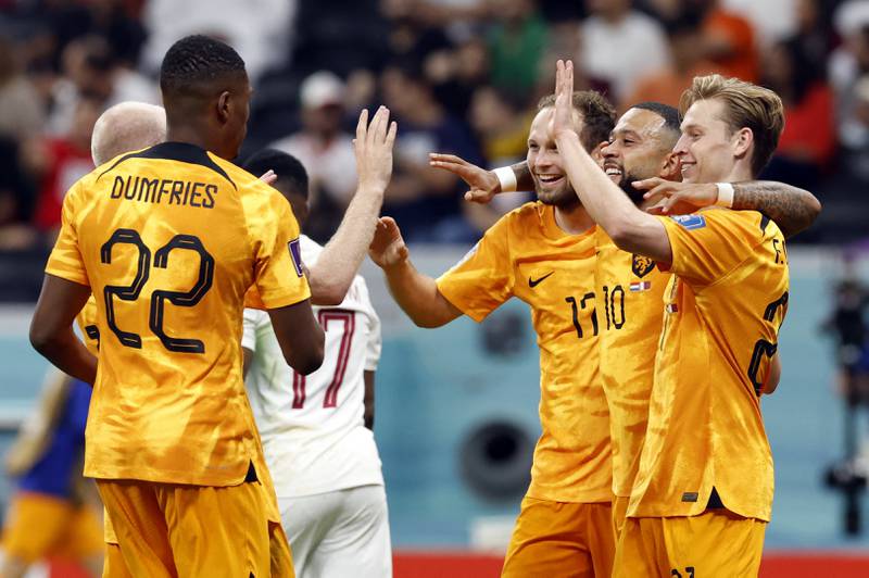 Netherlands' Frenkie de Jong celebrates scoring with Memphis Depay, Denzel Dumfries and Daley Blind. Reuters