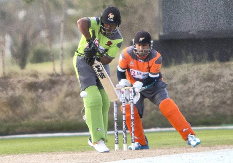 Al Ain, United Arab Emirates - Mohammed Usman of Dragons team batting the ball at the cricket match between Dragons vs Chennai at Al Ain Cricket Club, Equestrian Shooting & Golf Club.  Ruel Pableo for The National 
