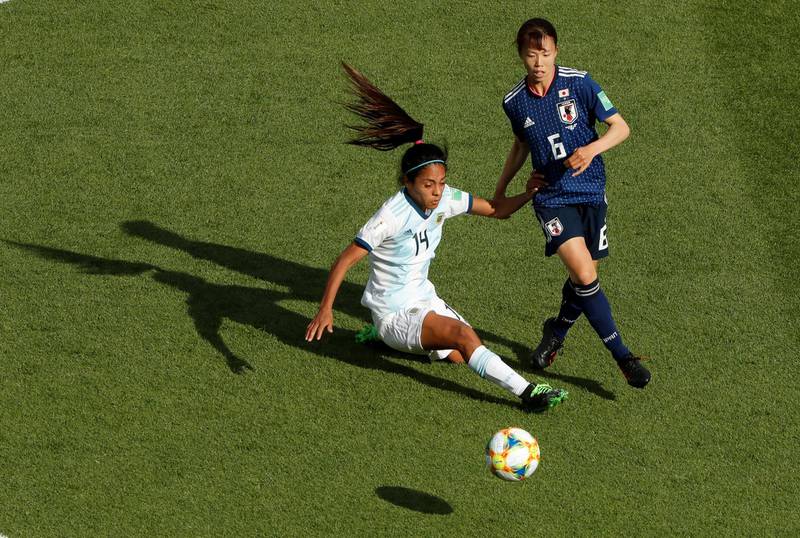 Argentina's Miriam Mayorga, left, in action against Japan's Hina Sugita. The Group D match ended 0-0. Reuters