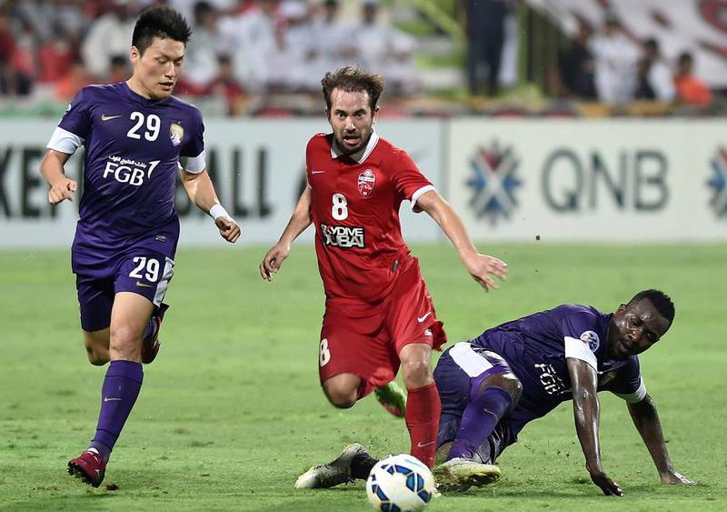 Everton Ribeiro, centre, showed in the Asian Champions League last-16 first leg how effective he can be for Al Ahli. STR / AFP