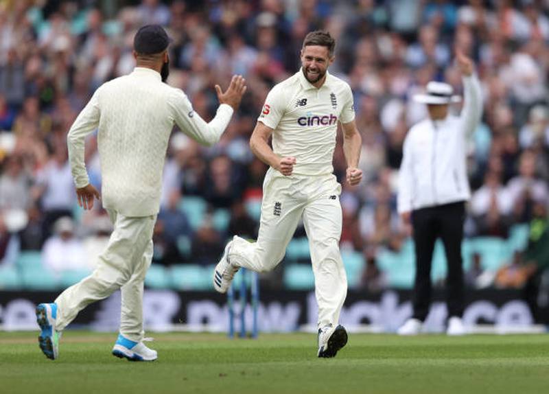 Chris Woakes celebrates after claiming Rohit Sharma's wicket. Getty