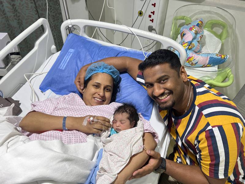 Nurse Sherin Babu gave birth to Seria Mary Rony at Medeor Hospital in Abu Dhabi just minutes into Eid Al Adha. Husband Rony Alexander is also pictured.