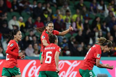 Morocco players celebrate their first goal against Colombia. AFP