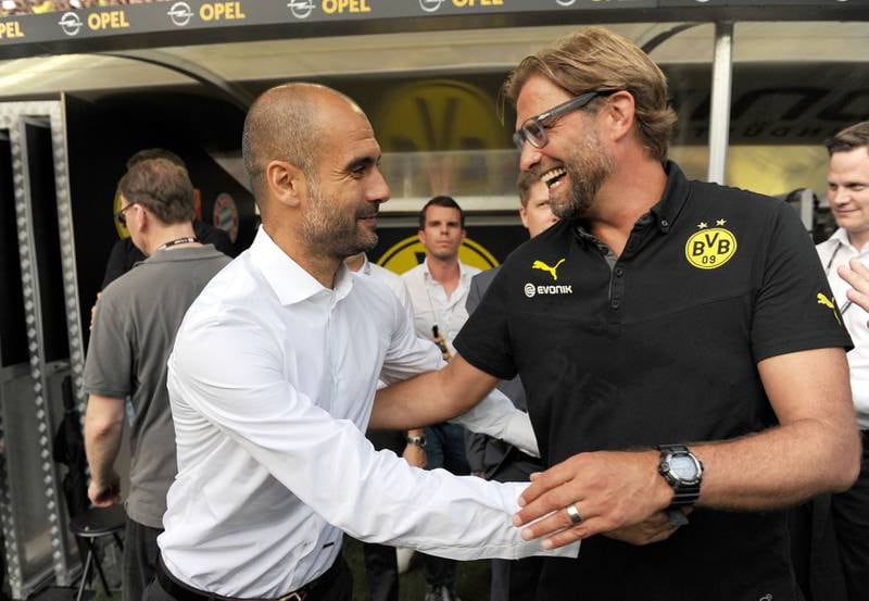 Jurgen Klopp and Pep Guardiola during their time in the Bundesliga.