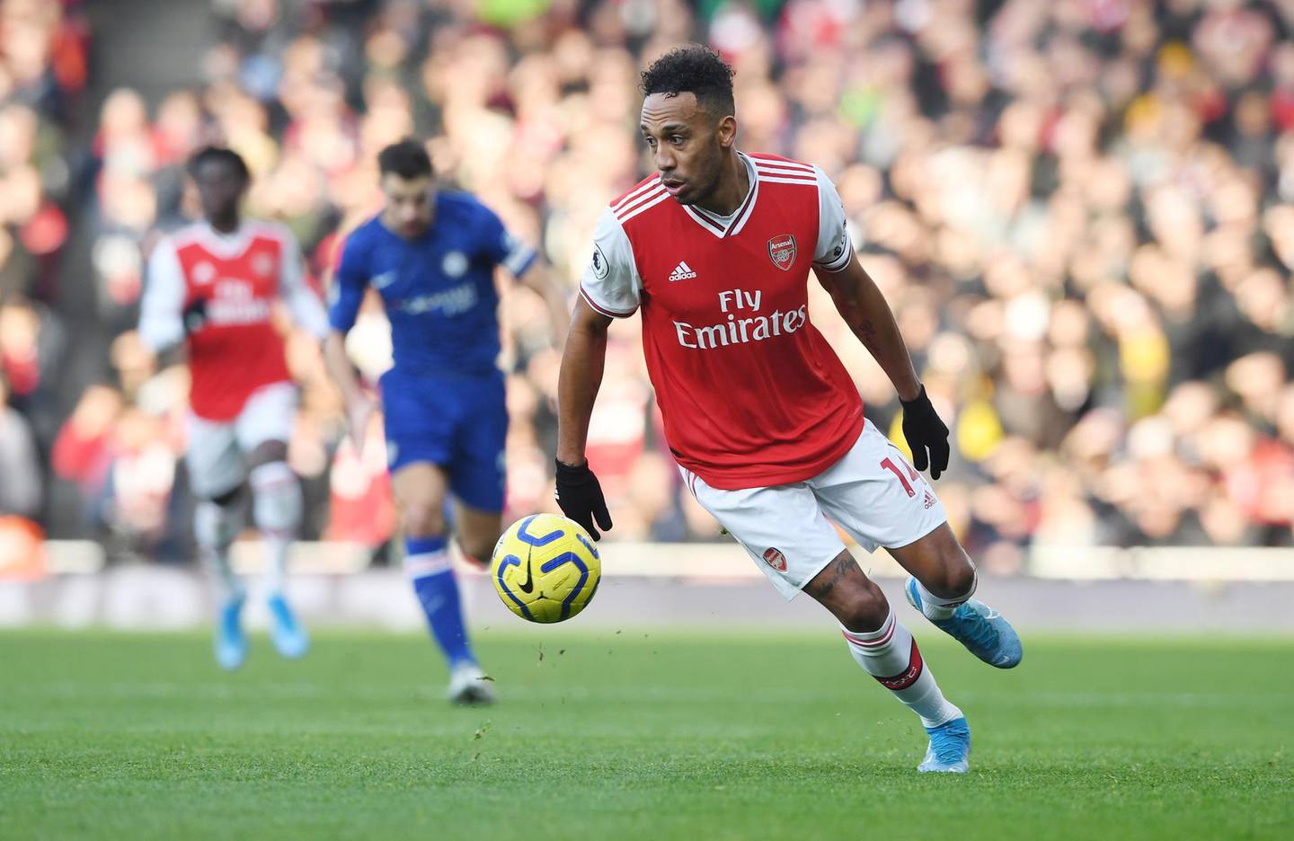 epa08093780 Arsenal's Pierre-Emerick Aubameyang in action during the English Premier League soccer match between Arsenal FC and Chelsea FC held at the Emirates stadium in London, Britain, 29 December 2019.  EPA/NEIL HALL EDITORIAL USE ONLY.  No use with unauthorized audio, video, data, fixture lists, club/league logos or 'live' services. Online in-match use limited to 120 images, no video emulation. No use in betting, games or single club/league/player publications.