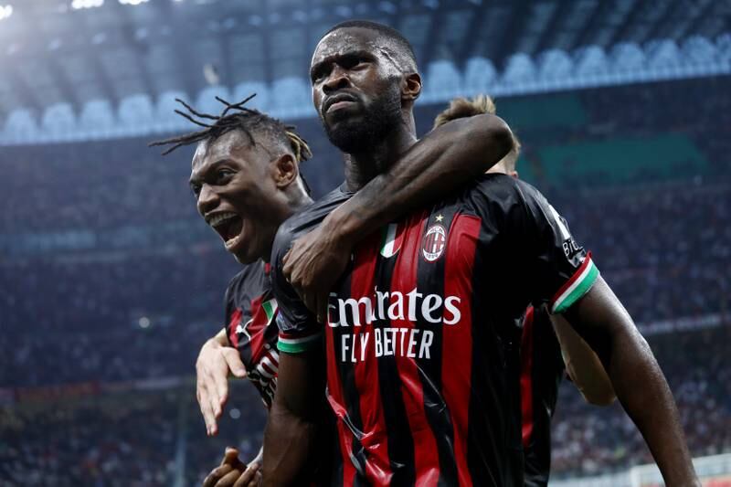 Fikayo Tomori celebrates with teammates after scoring AC Milan's first goal in their 2-0 Serie A win against Juventus at the San Siro on October 8, 2022. Getty