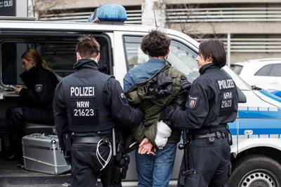 A pro-Kurdish protester is arrested in Duesseldorf.  / Marcel Kusch / dpa / AFP Photo