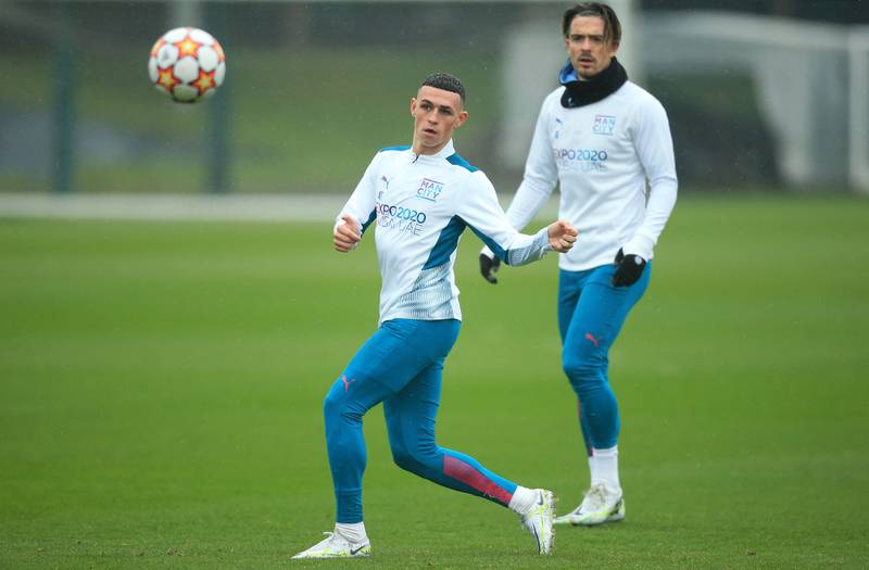 Phil Foden and Jack Grealish take part in City's training session. AFP