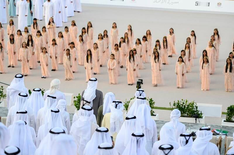 Sheikh Mohamed stands for the national anthem during the Union Parade at the Sheikh Zayed Heritage Festival. 
Eissa Al Hammadi for the Presidential Court  