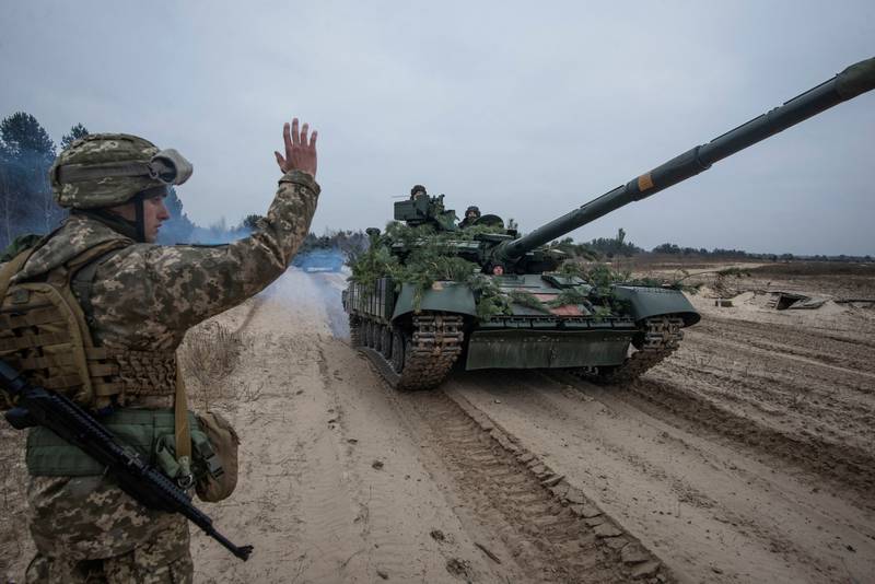 Ukrainian servicemembers take part in drills at a training ground in Ukraine. Reuters