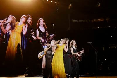 Swift performs with the band HAIM in Los Angeles. Getty Images