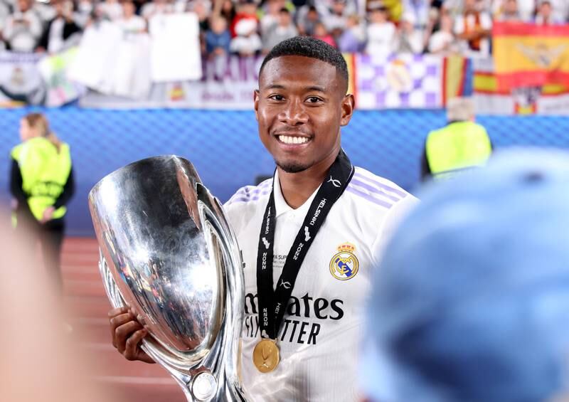 David Alaba of Real Madrid holds the trophy after winning the Uefa Super Cup final. EPA