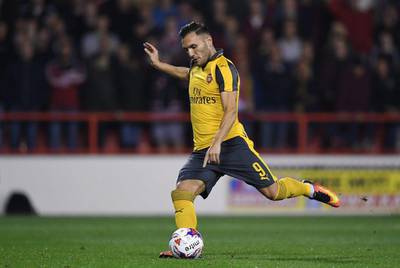 Lucas Perez of Arsenal scores his side’s second goal from the penalty spot. Shaun Botterill / Getty Images