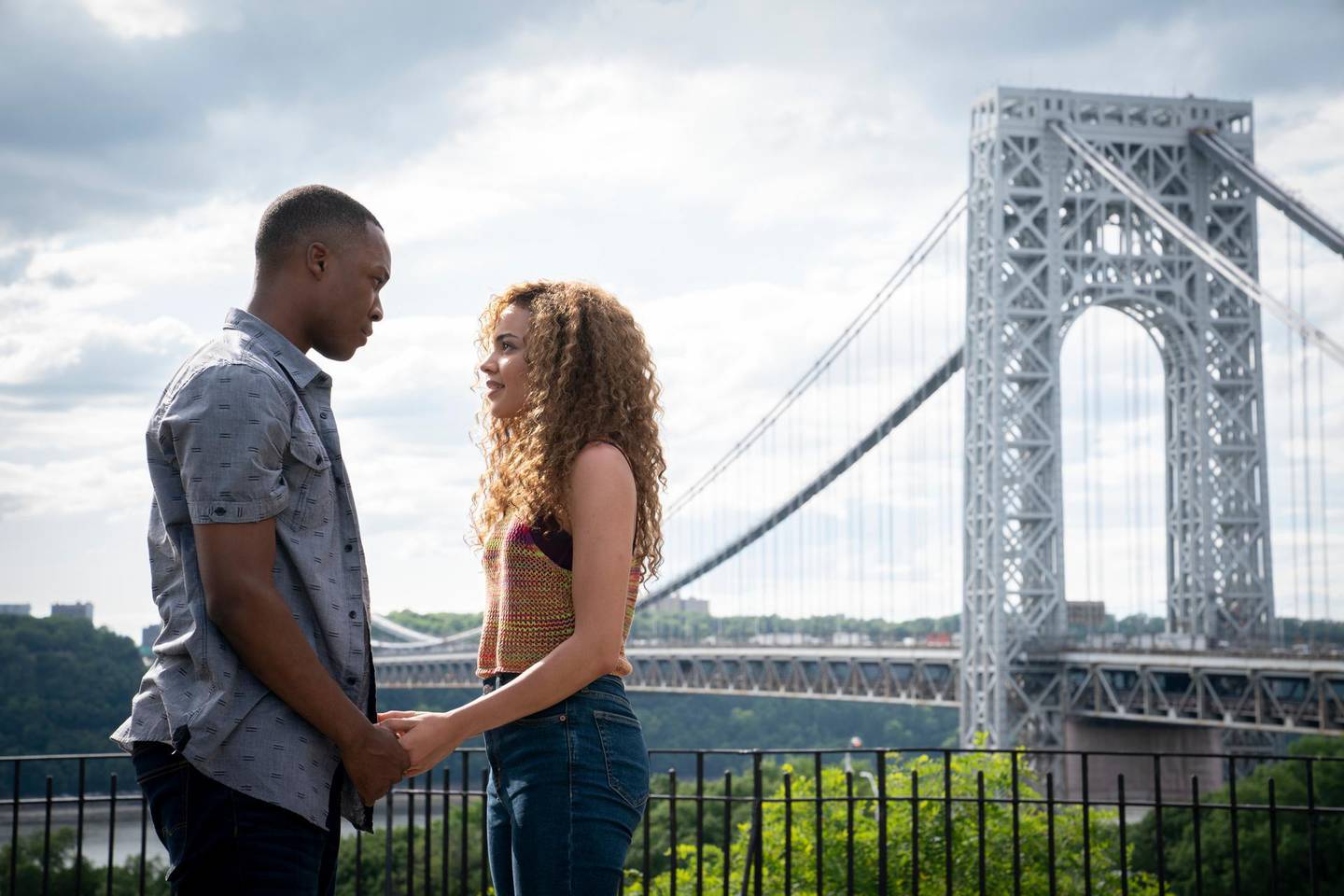 This image released by Warner Bros. Entertainment shows Corey Hawkins, left, and Leslie Grace in a scene from "In the Heights."   Every year, Hollywood inevitably comes under criticism for its lack of racial diversity.  It happened again with â€œIn the Heights,â€ a big-budget film based on the musical created by Lin-Manuel Miranda, which was called out this week for its dearth of dark-skinned, Black Latinos in leading roles. Â  (Macall Polay/Warner Bros. Entertainment via AP)