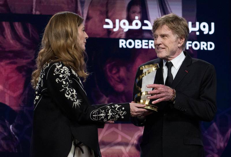 Robert Redford receives a career tribute award from French actress Chiara Mastroianni during the 18th annual Marrakech International Film Festival, in Marrakech.  EPA