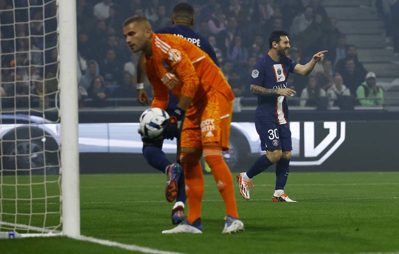 Lionel Messi celebrates scoring against Lyon. Reuters