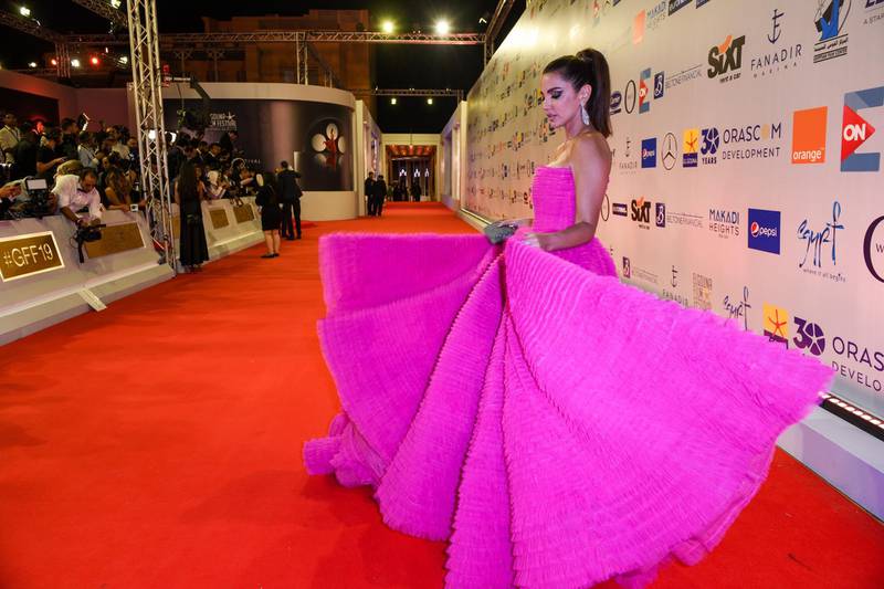 Tunisian actress Dorra Zarrouk walks the red carpet during the opening ceremony of the 3rd edition of El Gouna Film Festival, in the Egyptian Red Sea resort of el-Gouna, on September 19, 2019. (Photo by Ammar Abd Rabbo / El Gouna Film Festival / AFP) / RESTRICTED TO EDITORIAL USE