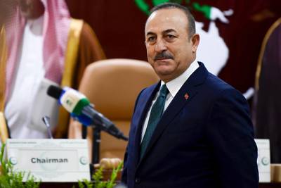 Turkish Foreign Minister Mevlut Cavusoglu arrives for an emergency ministerial meeting of the Organisation of Islamic Cooperation (OIC) in Jeddah. AFP