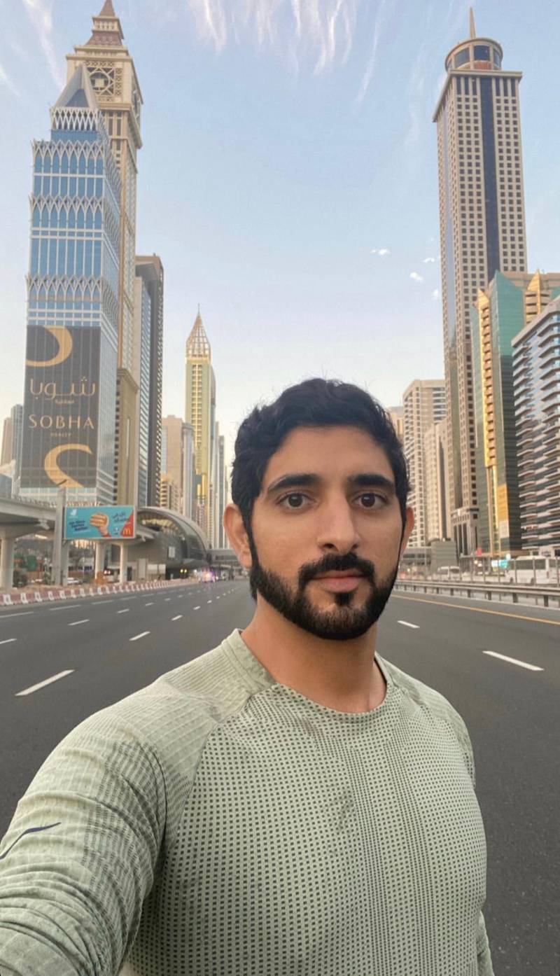 Dubai's Crown Prince, Sheikh Hamdan bin Mohammed, snaps a selfie before joining participants for the Dubai Run, part of the Dubai Fitness Challenge. Courtesy faz3 / Instagram