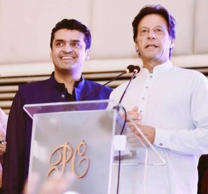 Fakhr-e-Alam with Pakistani Prime Minister Imran Khan a few years ago. 