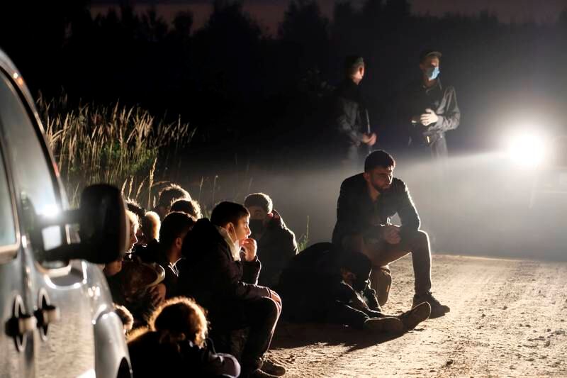 A group of illegal migrants who were detained in Vorzova, Latvia, where a state of emergency will run until November. EPA