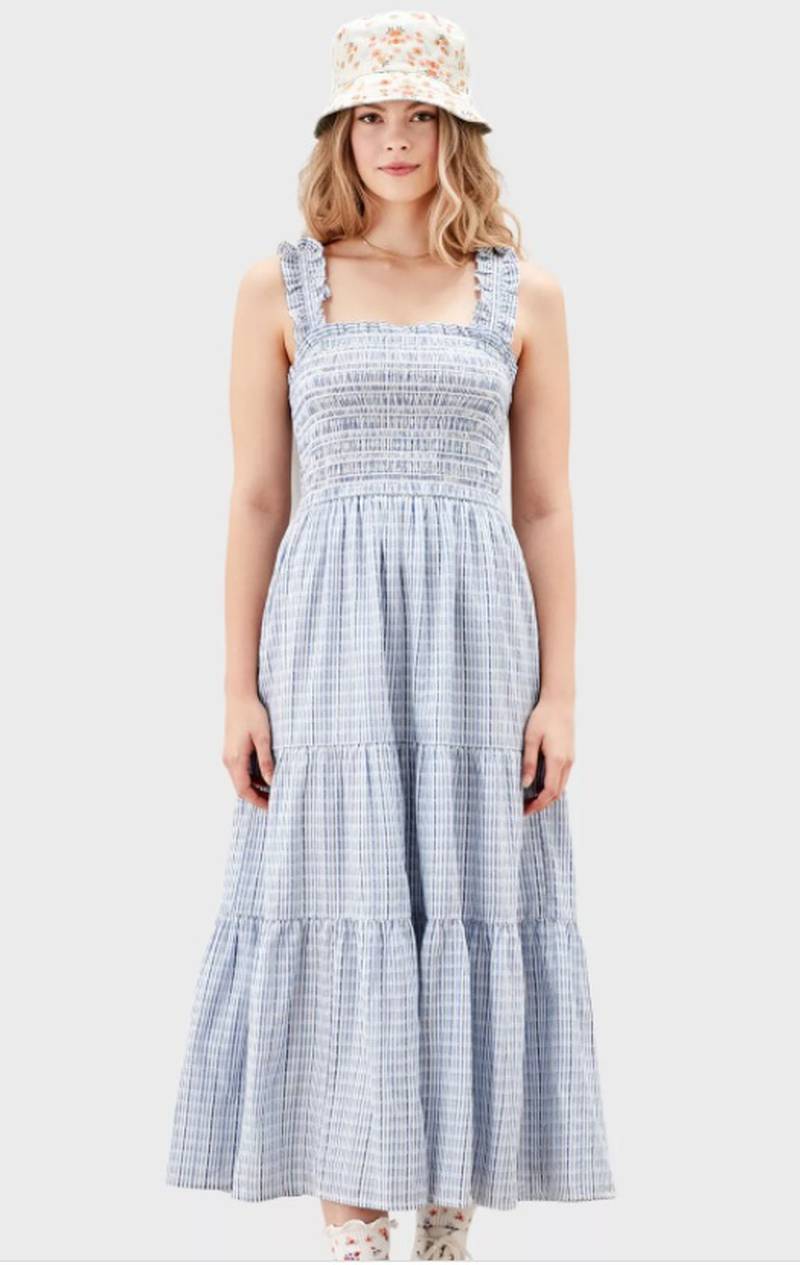 With its ruched, elasticated bodice and cute strap detailing, this cottagecore dress by American Eagle is made for picnics in meadows; Dh156, American Eagle at namshi.com. Photo: American Eagle