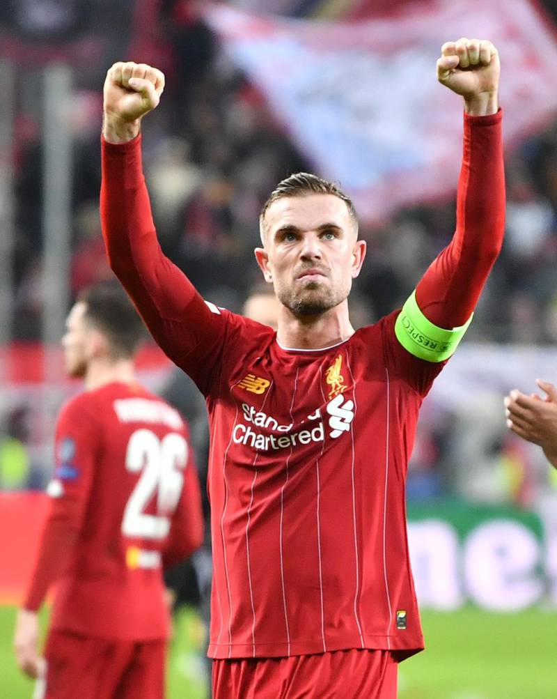 Liverpoolmidfielder Jordan Henderson reacts at the end of the UEFA Champions League Group E match against RB Salzburg. AFP