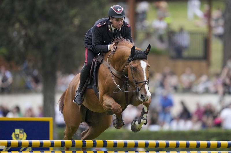 Italy's Emanuele Gaudiano on Chalou clears the bar to win the Six Bars horse jumping competition in Rome in May 2022. AP 
