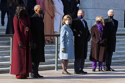 Barack Obama, Michelle Obama, George W Bush and Laura Bush, and Bill Clinton and Hillary Clinton attend a wreath-laying ceremony at the Tomb of the Unknown Soldier at the US Capitol on January 20. AFP