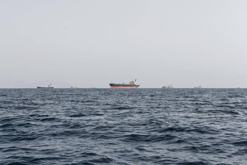 Brent crude is steady after hitting a one-year low of US$46.59 on January 13. The commodity closed at $58.73 per barrel on Friday.  Above, tanker ships readying to load oil. Reem Mohammed / The National
