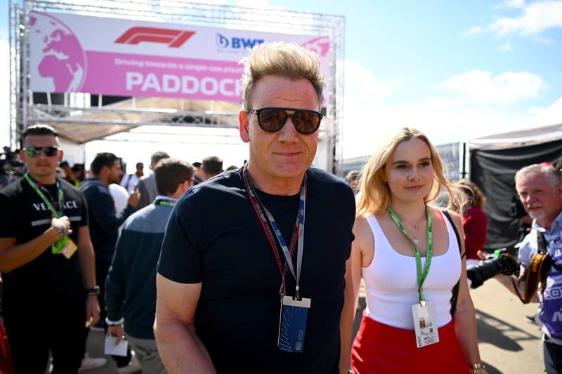 Chef Gordon Ramsay arrives in the paddock with his daughter Holly. Getty