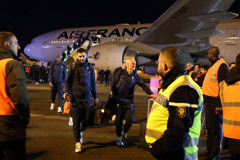 Hugo Lloris and Didier Deschamps arrive back in France from the World Cup in Qatar. AFP