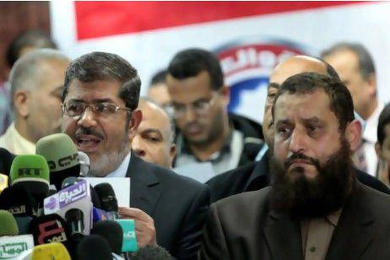 The Muslim Brotherhood’s Mohammed Morsi, who has since been elected president (left) is shown with Emad Abdel Ghafour, chairman of the Salafi Al Nour Party, in January. Egypt’s Salafi movements are now splintered and foundering politically.