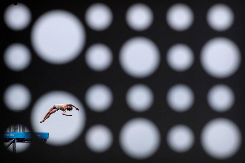 Gold medalist Gary Hunt of Britain dives during the men's high diving competition at the World Swimming Championships in Gwangju, South Korea. AP