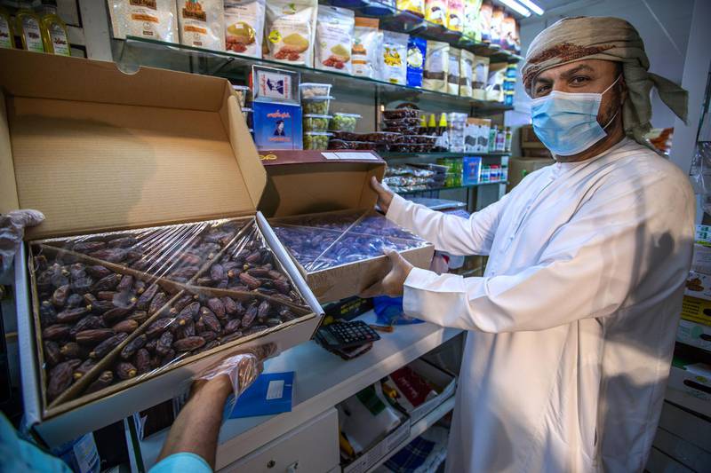 Abu Dhabi, United Arab Emirates, April 16, 2020.  A Ramadan date shopper at the Abu Dhabi Dates Marketat, Mina Zayed.Victor Besa / The NationalSection:  NAFor:  Standalone/Stock Images