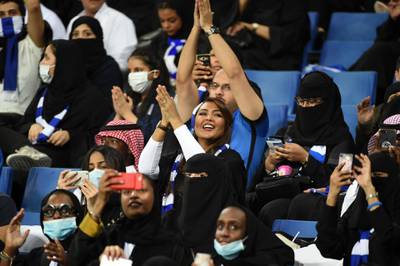 Saudi women attend the AFC Champions League group stage football match between Saudi Arabia's Al Hilal and UAE's Al Ain at King Saud University Stadium in Riyadh, on February 13, 2018. / AFP PHOTO / FAYEZ NURELDINE