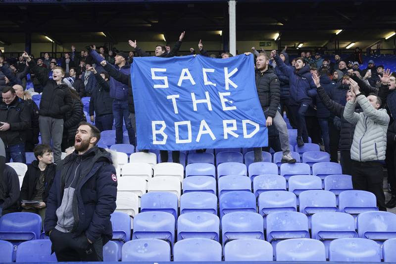 Fans protest against the Everton board during the match against Aston Villa at Goodison Park on Saturday, January 22, 2022. AP