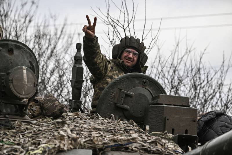 A Ukrainian serviceman moves towards the frontline city of Bakhmut. AFP