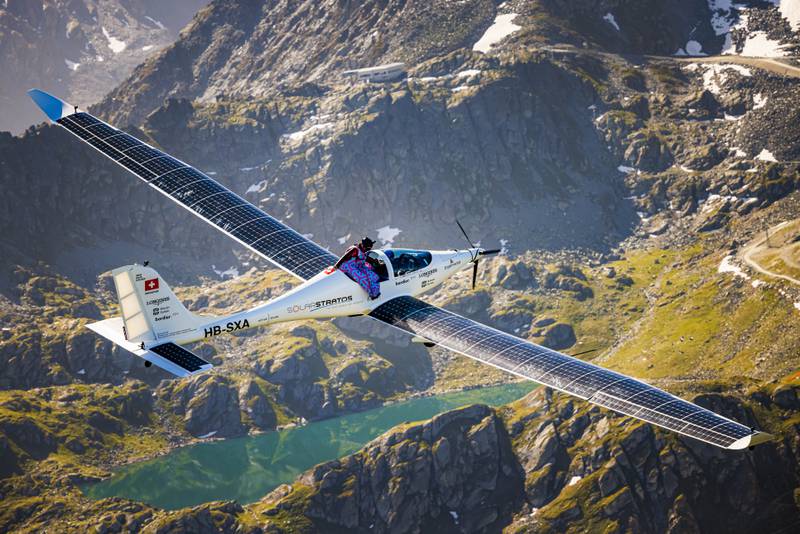 Swiss freeride snowboarder, base jumper and wingsuit pilot Geraldine Fasnacht prepares to jump out of SolarStratos, a solar powered aircraft prototype, above the Alpine resort of Verbier, June 18, 2022. AP