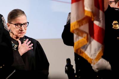 Ruth Bader Ginsburg stands during the national anthem at a US Citizenship and Immigration Services naturalisation ceremony at the New York Historical Society Museum and Library in Manhattan, New York on April 10, 2017. Reuters