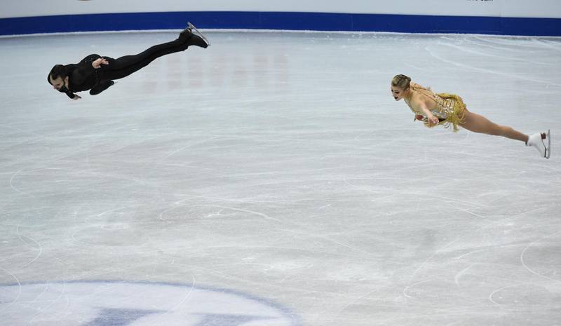Ashley Cain, right, and Timothy Leduc of the US perform during the pairs free skating program at the ISU Four Continents figure skating championships in Taipei. Anthony Wallace / AFP