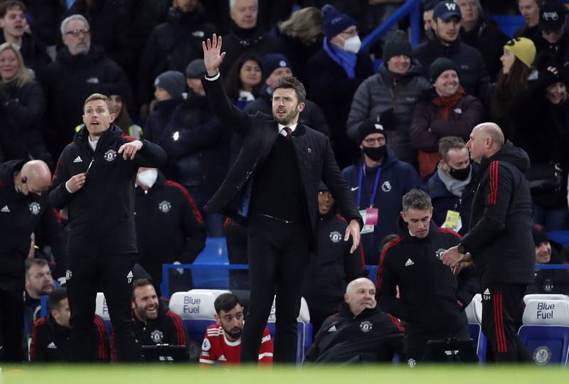 Michael Carrick on the touchline at Stamford Bridge. AFP